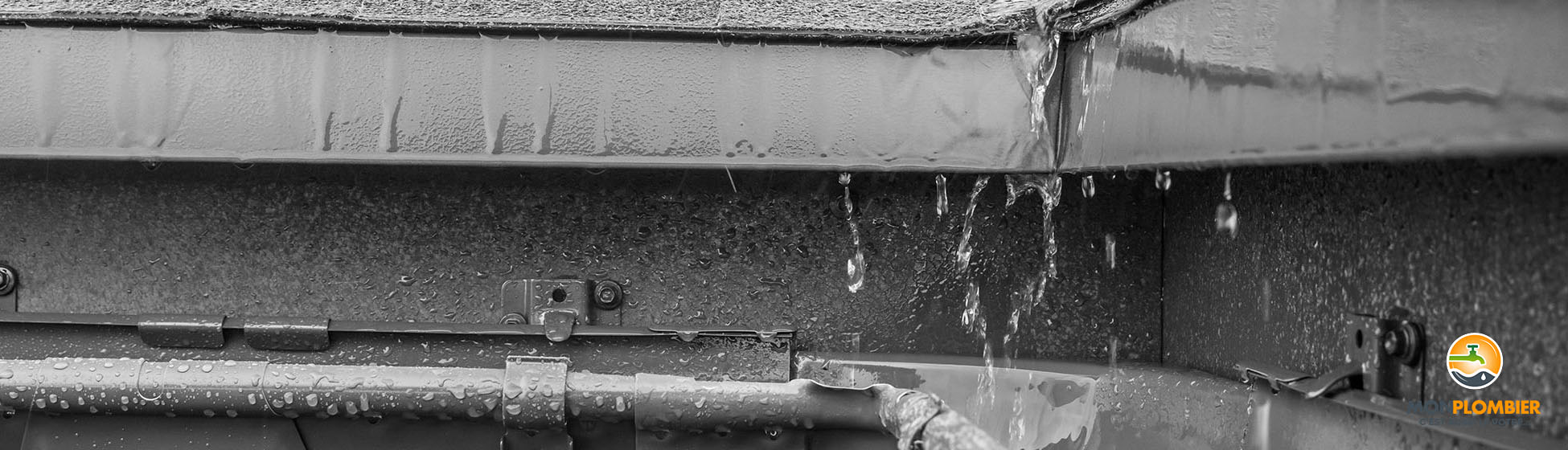 Installation recuperateur eau de pluie sur gouttiere